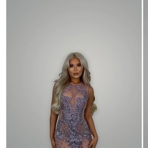 Brand new never worn. Brought it for an occasion but never got to wear it.